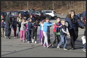 Connecticut School Shooting - Children led away from the scene